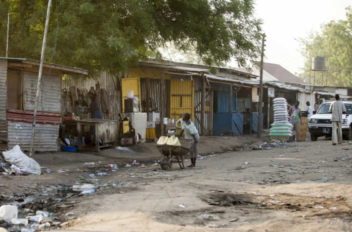 Menschen im Sudan bei ihrer täglichen Arbeit