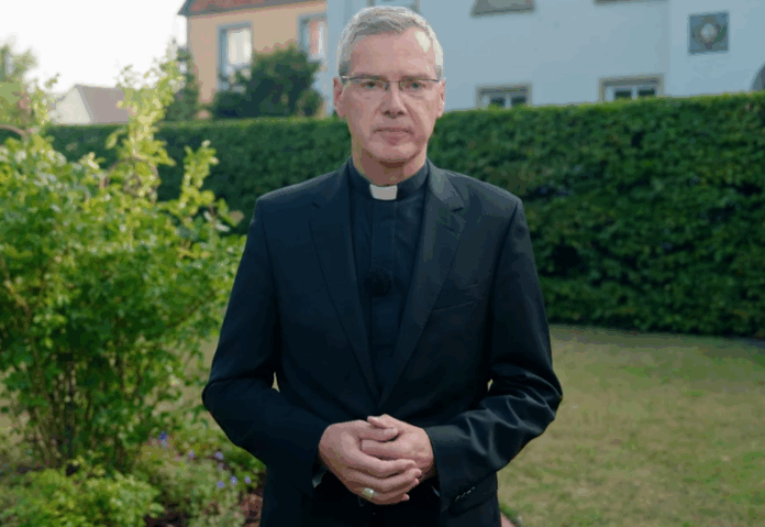 Bischof Wilmer fordert beim Symposium für Kurienkardinal Kurt Koch eine 